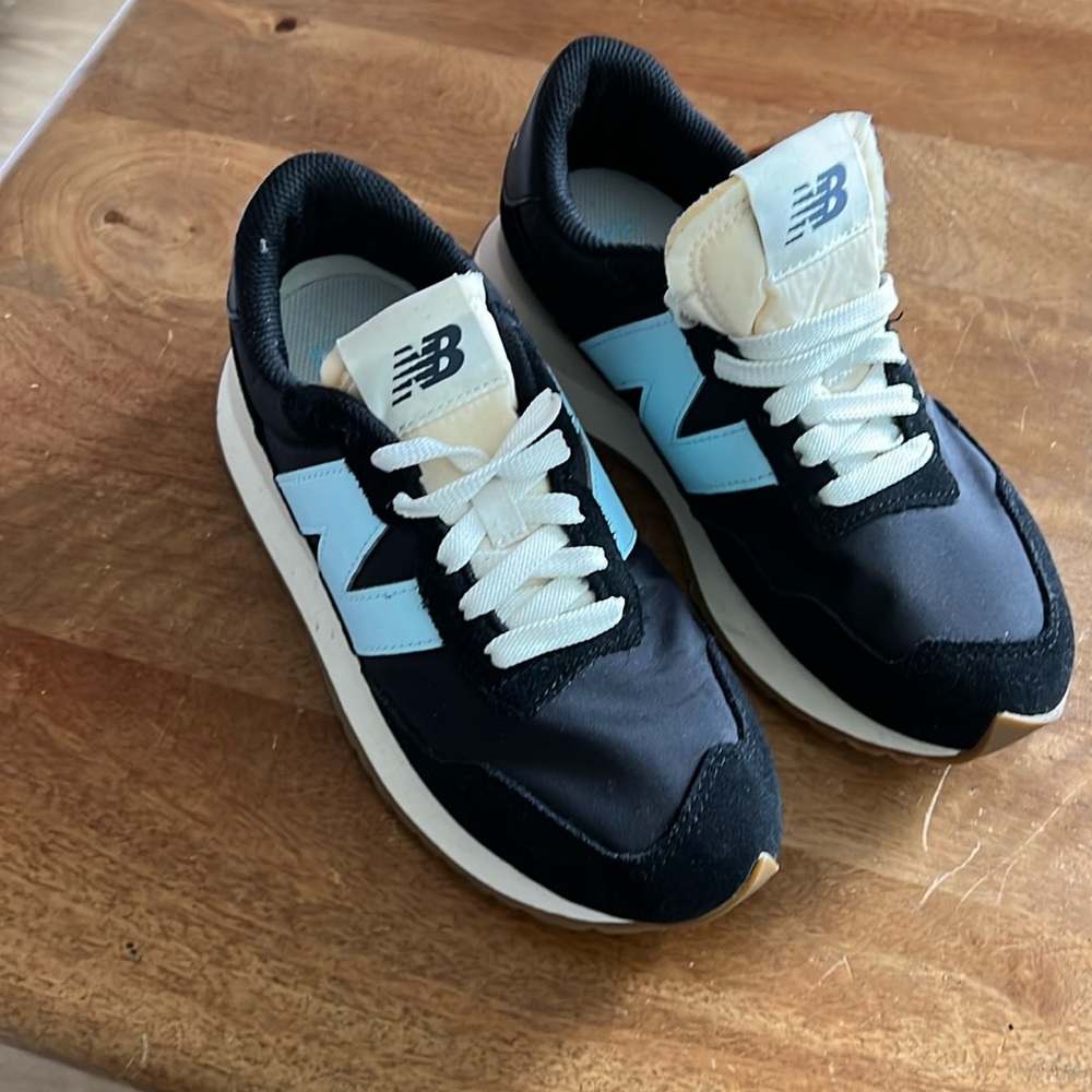 Here’s a great pair of woman’s 237 blue New Balance